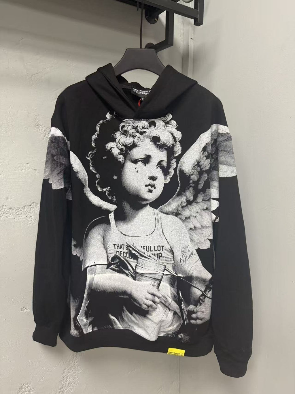 THAT'S A AWFUL LOT OF COUGH SYRUP Angel Tears Graphic Hoodie ¡ª front